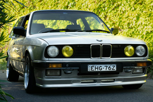 Vehicle identification number plate on car door frame